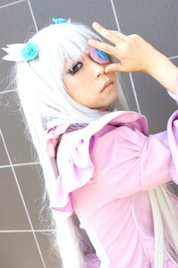 Rating: Safe Score: 0 Tags: 1girl animal_ears barasuishou flower hair_flower hair_ornament hands lips long_hair nail_polish solo upper_body white_hair User: admin