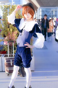 Rating: Safe Score: 0 Tags: 1girl blonde_hair building city fur_trim hat multiple_boys shorts solo souseiseki standing white_legwear User: admin