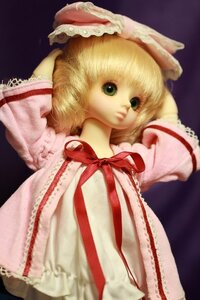 Rating: Safe Score: 0 Tags: 1girl blonde_hair doll dress green_eyes hat hinaichigo looking_at_viewer ribbon short_hair simple_background solo upper_body User: admin