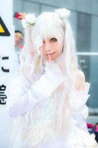 Rating: Safe Score: 0 Tags: 1girl animal_ears bangs bare_shoulders blurry blurry_background blurry_foreground cellphone depth_of_field flower hair_flower hair_ornament hair_over_one_eye kirakishou lips long_hair looking_at_viewer phone photo smartphone solo white_hair User: admin