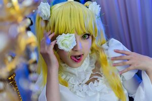 Rating: Safe Score: 0 Tags: 1girl bangs blonde_hair blurry depth_of_field flower hair_ornament kirakishou long_hair solo tongue tongue_out User: admin