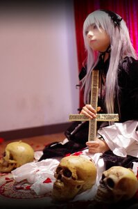Rating: Safe Score: 0 Tags: 1girl blurry hairband instrument long_hair sitting solo suigintou User: admin
