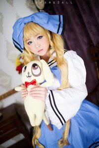 Rating: Safe Score: 0 Tags: 1girl blonde_hair blue_bow blue_eyes blurry blurry_background bow depth_of_field dress hair_bow holding lips long_hair long_sleeves looking_at_viewer photo shinku solo User: admin