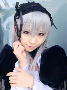 Rating: Safe Score: 0 Tags: 1girl bangs closed_mouth dress hairband head_rest lips long_hair long_sleeves looking_at_viewer purple_eyes ribbon silver_hair smile solo suigintou upper_body User: admin