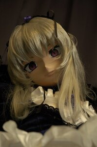 Rating: Safe Score: 0 Tags: 1girl auto_tagged blonde_hair dark dress long_hair looking_at_viewer ribbon smile solo suigintou yakumo_yukari User: admin