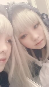 Rating: Safe Score: 0 Tags: 2girls bangs blonde_hair close-up closed_mouth face lips long_hair looking_at_viewer multiple_girls solo suigintou User: admin