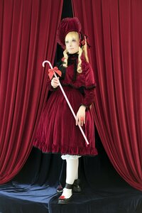 Rating: Safe Score: 0 Tags: 1girl blonde_hair blue_eyes bonnet bow curtains dress hat holding long_hair red_dress shinku shoes solo standing User: admin