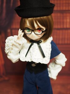Rating: Safe Score: 0 Tags: 1girl adjusting_eyewear blurry brown_hair depth_of_field doll frills glasses hat heterochromia long_sleeves looking_at_viewer pants red_eyes ribbon short_hair smile solo souseiseki User: admin