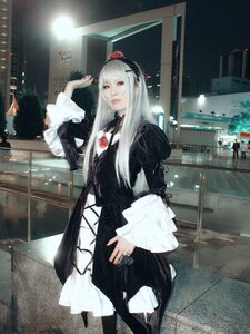 Rating: Safe Score: 0 Tags: 1girl black_dress black_legwear dress flower gothic_lolita indoors lolita_fashion long_hair long_sleeves looking_at_viewer red_eyes solo standing suigintou white_hair User: admin