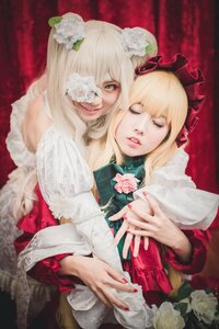 Rating: Safe Score: 0 Tags: 2girls bare_shoulders blonde_hair closed_eyes dress eyepatch flower hair_ornament hug_from_behind lips long_hair multiple_cosplay multiple_girls nail_polish red_lips rose tagme white_flower white_rose User: admin