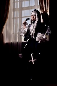 Rating: Safe Score: 0 Tags: 1girl curtains dress holding indoors long_hair sitting solo suigintou very_long_hair window User: admin