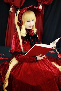 Rating: Safe Score: 0 Tags: 1girl blonde_hair blue_eyes bonnet book curtains dress flower lips long_hair red_dress rose shinku sitting solo User: admin