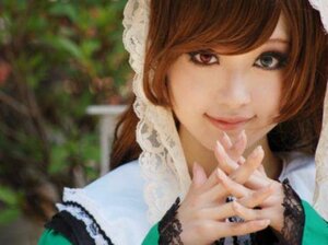 Rating: Safe Score: 0 Tags: 1girl bangs blurry blurry_background blurry_foreground brown_hair closed_mouth depth_of_field fingernails lips long_sleeves looking_at_viewer maid own_hands_together realistic smile solo suiseiseki User: admin