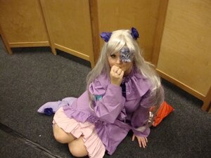 Rating: Safe Score: 0 Tags: 1girl barasuishou dress flower frills hair_ornament long_hair long_sleeves purple_dress sitting solo User: admin