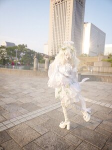 Rating: Safe Score: 0 Tags: 1girl bridal_veil building checkered checkered_floor day dress flower high_heels kirakishou solo tile_floor tiles veil wedding_dress white_dress white_footwear User: admin