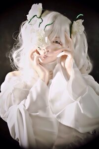 Rating: Safe Score: 0 Tags: 1girl animal_ears bangs black_background closed_mouth hair_ornament kirakishou lips long_sleeves looking_at_viewer solo upper_body white_hair white_sweater User: admin