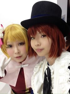 Rating: Safe Score: 0 Tags: 2girls 3d blonde_hair brown_eyes gloves hat lips looking_at_viewer multiple_cosplay multiple_girls realistic red_hair short_hair smile tagme top_hat User: admin