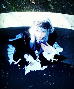 Rating: Safe Score: 0 Tags: 1girl dress long_sleeves lying purple_eyes solo suigintou User: admin
