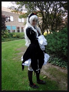 Rating: Safe Score: 0 Tags: 1girl black_border black_dress black_footwear border day dress frills full_body gothic_lolita hairband letterboxed lolita_fashion long_hair long_sleeves outdoors pillarboxed solo standing suigintou tree white_hair User: admin