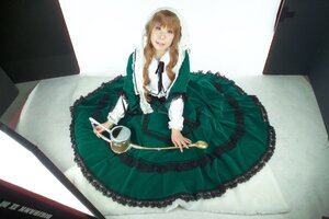 Rating: Safe Score: 0 Tags: 1girl brown_hair cup dress green_dress lolita_fashion long_sleeves saucer sitting solo suiseiseki tea teacup User: admin