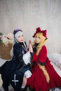 Rating: Safe Score: 0 Tags: 2girls blonde_hair blue_eyes doll_joints dress flower frills holding_hands lips long_hair looking_at_viewer multiple_cosplay multiple_girls red_dress signature sitting tagme User: admin