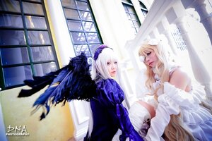 Rating: Safe Score: 0 Tags: 2girls blonde_hair dress feathers indoors lips long_hair long_sleeves multiple_cosplay multiple_girls sisters suigintou tagme window wings User: admin