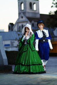 Rating: Safe Score: 0 Tags: 2girls blue_dress blue_eyes blurry blurry_background blurry_foreground brown_hair depth_of_field dress green_dress hat long_sleeves multiple_cosplay multiple_girls outdoors photo photo_background standing tagme white_legwear User: admin