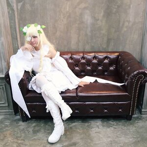 Rating: Safe Score: 0 Tags: 1girl bare_shoulders blonde_hair boots crossed_legs dress kirakishou long_hair sitting solo white_dress User: admin
