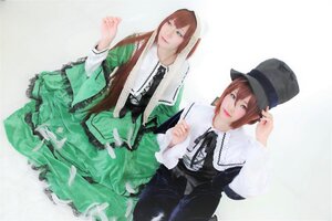 Rating: Safe Score: 0 Tags: 2girls brown_hair dress frills green_dress hat lips long_sleeves looking_at_viewer multiple_cosplay multiple_girls ribbon short_hair siblings sisters smile souseiseki suiseiseki tagme top_hat twins User: admin