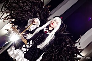 Rating: Safe Score: 0 Tags: 1girl black_wings dress hairband long_hair red_eyes solo suigintou weapon white_hair wings User: admin
