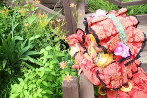 Rating: Safe Score: 0 Tags: 1girl blonde_hair flandre_scarlet flower hat hat_ribbon mob_cap shinku short_hair solo User: admin