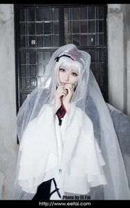 Rating: Safe Score: 0 Tags: 1girl hairband indoors letterboxed long_hair long_sleeves looking_at_viewer own_hands_together solo striped suigintou window User: admin