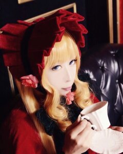Rating: Safe Score: 0 Tags: 1girl bangs blonde_hair blue_eyes bow cup dress flower long_hair long_sleeves rose shinku solo teacup upper_body User: admin