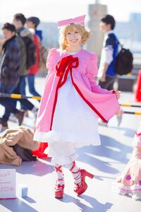 Rating: Safe Score: 0 Tags: 1girl black_hair blonde_hair blurry blurry_background blurry_foreground depth_of_field dress hat hinaichigo multiple_boys photo smile solo standing User: admin