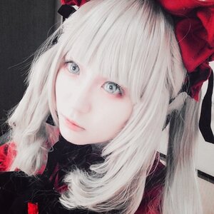 Rating: Safe Score: 0 Tags: 1girl bangs blue_eyes bow closed_mouth looking_at_viewer portrait ribbon shinku silver_hair simple_background solo User: admin