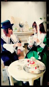 Rating: Safe Score: 0 Tags: 1boy book brown_hair dress flower hat letterboxed long_hair multiple_cosplay sitting tagme top_hat User: admin