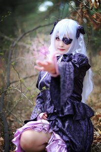 Rating: Safe Score: 0 Tags: 1girl barasuishou blurry blurry_foreground depth_of_field dress eyepatch frills gothic_lolita lips lolita_fashion long_hair long_sleeves sitting solo white_hair User: admin