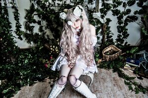 Rating: Safe Score: 0 Tags: 1girl boots dress flower hair_flower hair_ornament joints kirakishou knee_boots long_hair rose sitting solo tree white_footwear white_hair User: admin