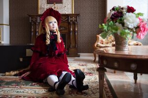Rating: Safe Score: 0 Tags: 1girl blonde_hair blue_eyes bonnet book cat dress flower long_hair rose shinku sitting solo User: admin