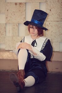 Rating: Safe Score: 0 Tags: 1girl blue_eyes blue_headwear blurry boots brick_wall brown_hair hat lips long_sleeves nose realistic ribbon short_hair sitting solo souseiseki User: admin