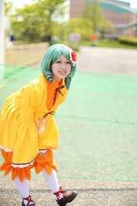 Rating: Safe Score: 0 Tags: 1girl blurry blurry_background depth_of_field flower hair_flower hair_ornament kanaria orange_dress outdoors photo smile solo standing User: admin