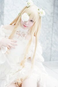 Rating: Safe Score: 0 Tags: 1girl angel_wings bangs blonde_hair blurry closed_mouth depth_of_field flower kirakishou lips long_hair long_sleeves sitting solo white_flower User: admin
