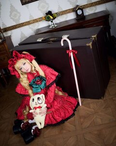 Rating: Safe Score: 0 Tags: 1girl blonde_hair blue_eyes doll dress flower long_hair red_dress shinku sitting solo stuffed_animal User: admin