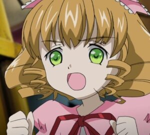 Rating: Safe Score: 0 Tags: 1girl blonde_hair blurry clenched_hand depth_of_field drill_hair green_eyes hina_ichigo hinaichigo image open_mouth ribbon short_hair solo User: admin
