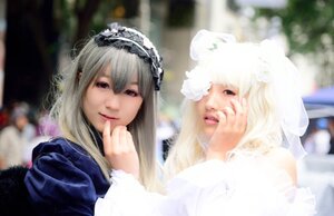 Rating: Safe Score: 0 Tags: 2girls blonde_hair blurry blurry_background blurry_foreground depth_of_field dress hairband lips long_hair looking_at_viewer multiple_cosplay multiple_girls suigintou tagme User: admin