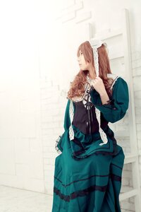 Rating: Safe Score: 0 Tags: 1girl brown_hair dress frills green_dress long_hair long_sleeves ponytail profile solo standing suiseiseki User: admin