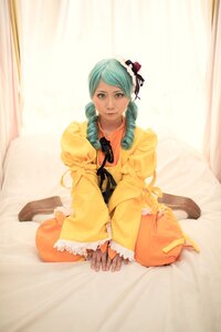 Rating: Safe Score: 0 Tags: 1girl aqua_hair curtains drill_hair green_eyes hat kanaria lips long_sleeves sitting solo wide_sleeves User: admin