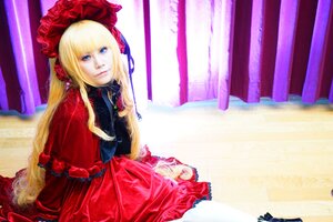Rating: Safe Score: 0 Tags: 1girl blonde_hair blue_eyes bonnet curtains dress long_hair long_sleeves looking_at_viewer red_dress shinku sitting solo very_long_hair User: admin