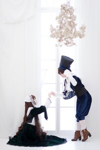 Rating: Safe Score: 0 Tags: 2boys brown_hair hat indoors long_sleeves multiple_boys multiple_cosplay pants sitting standing striped tagme top_hat User: admin