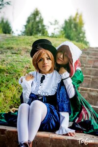 Rating: Safe Score: 0 Tags: 2girls 91076 blonde_hair blurry depth_of_field green_eyes hat lips long_hair multiple_cosplay multiple_girls outdoors sitting tagme white_legwear User: admin